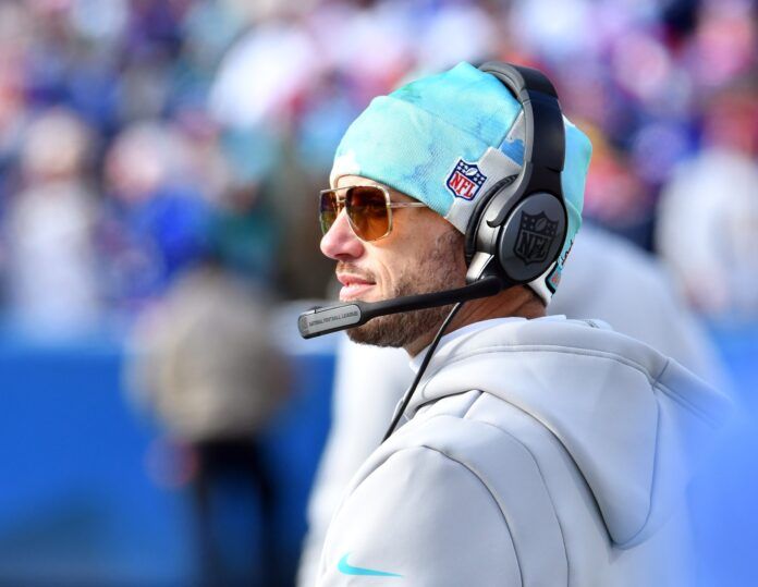 Mike McDaniel reacts against the Buffalo Bills during the first half.