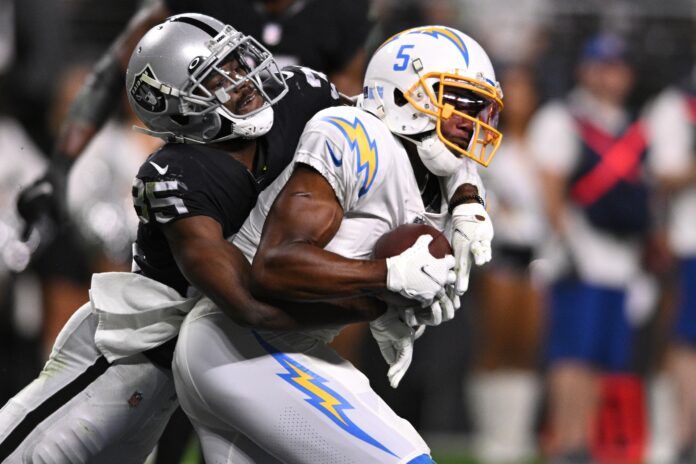 Los Angeles Chargers WR Josh Palmer (5) catches a TD pass against the Raiders.