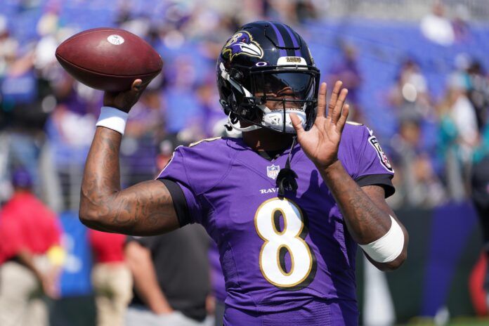 Lamar Jackson warms up prior to the game against the Miami Dolphins.