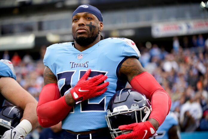 Derrick Henry listens to the National Anthem as the team gets ready to face the Cincinnati Bengals.