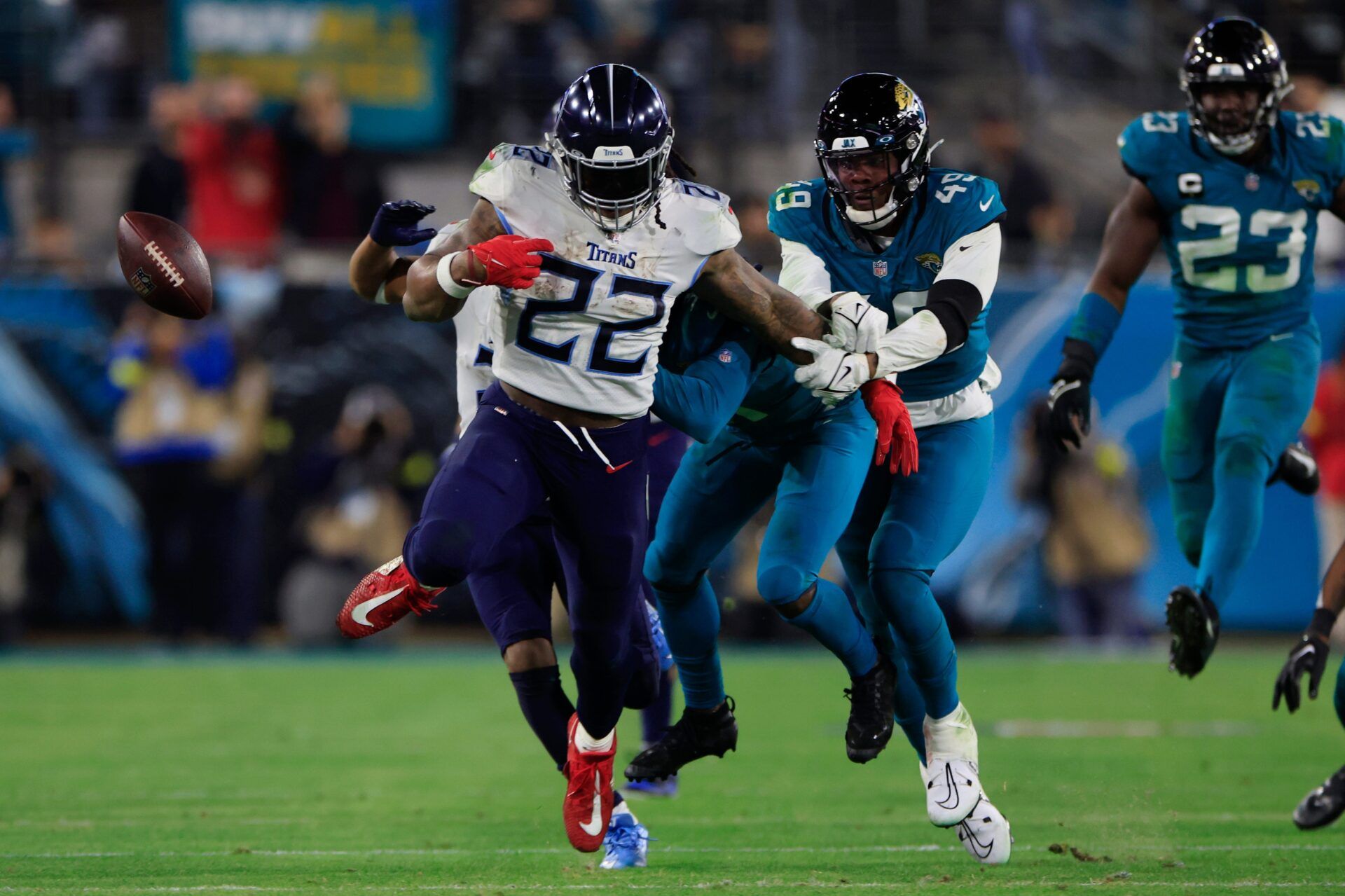 Tennessee Titans RB Derrick Henry (22) runs away from the Jaguars in the season finale.