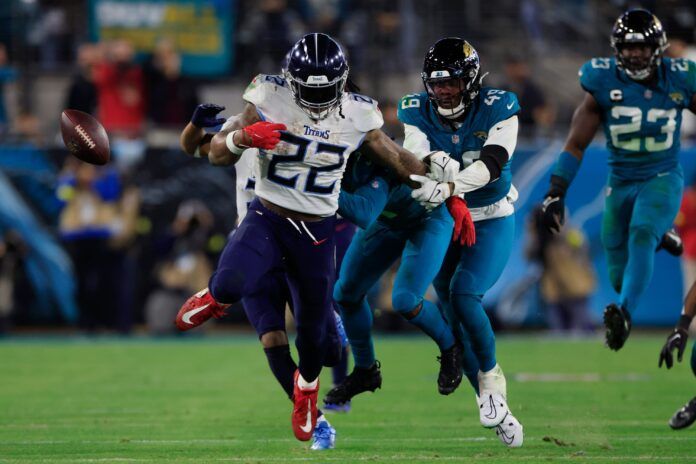 Tennessee Titans RB Derrick Henry (22) runs away from the Jaguars in the season finale.