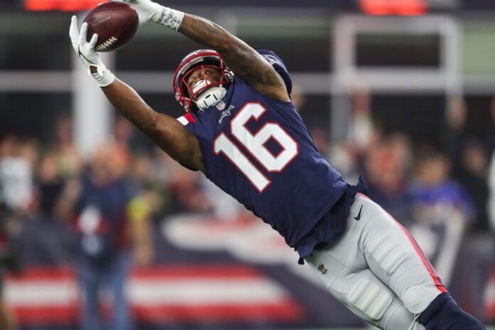 New England Patriots WR Jakobi Meyers (16) leaps for a catch.