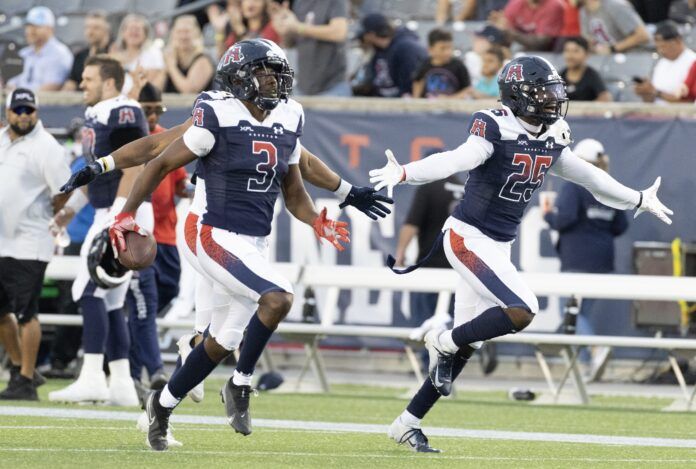 Houston Roughnecks defensive back Ajene Harris celebrates his interception against the Arlington Renegades.