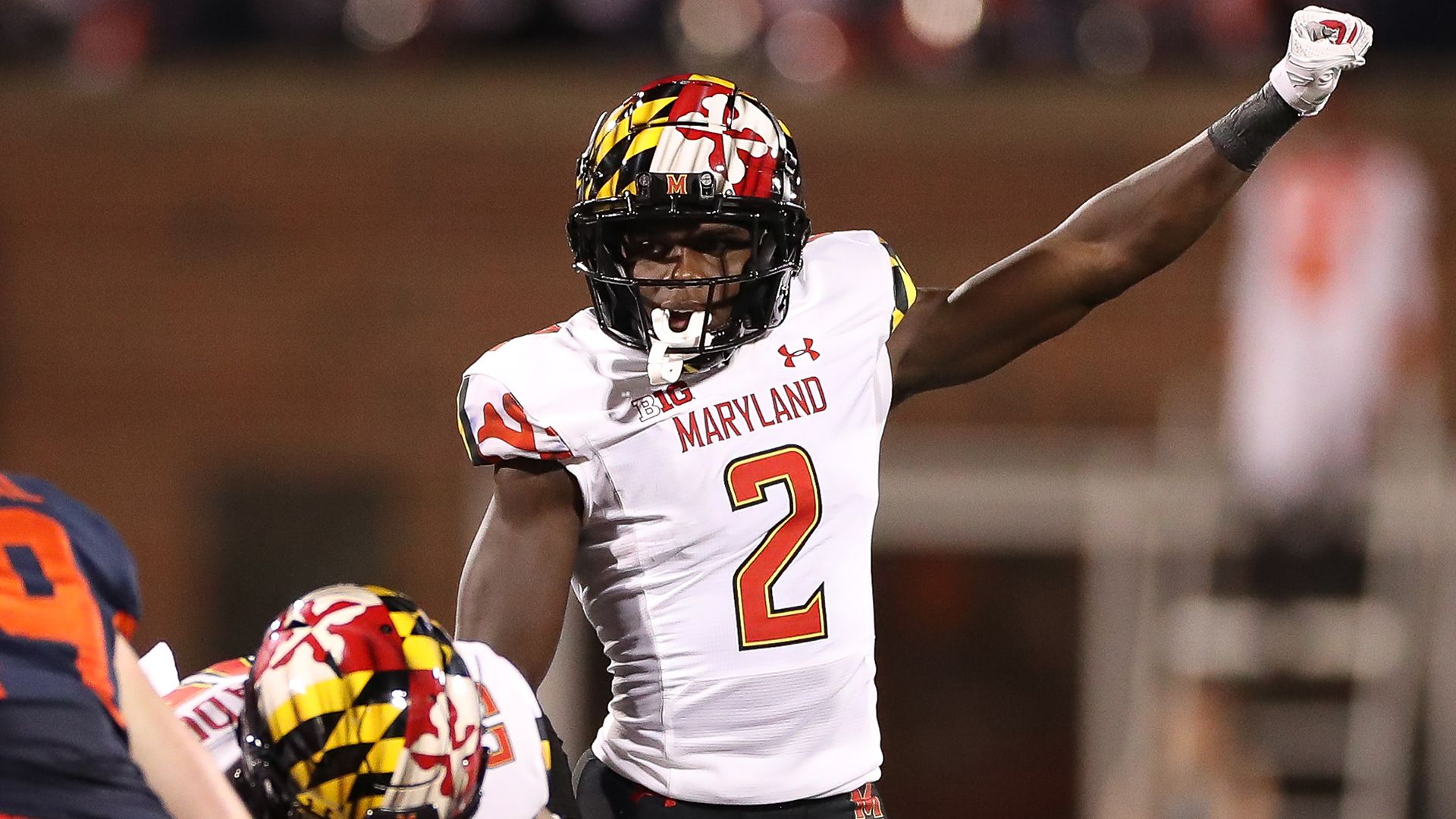 Jakorian Bennett points to the sideline prior to the snap.