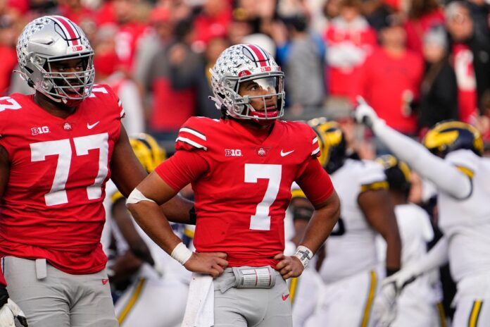 C.J. Stroud looks on after a play against Michigan.