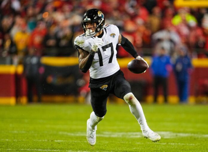 Evan Engram runs with the ball during the second half of the AFC Divisional Round.