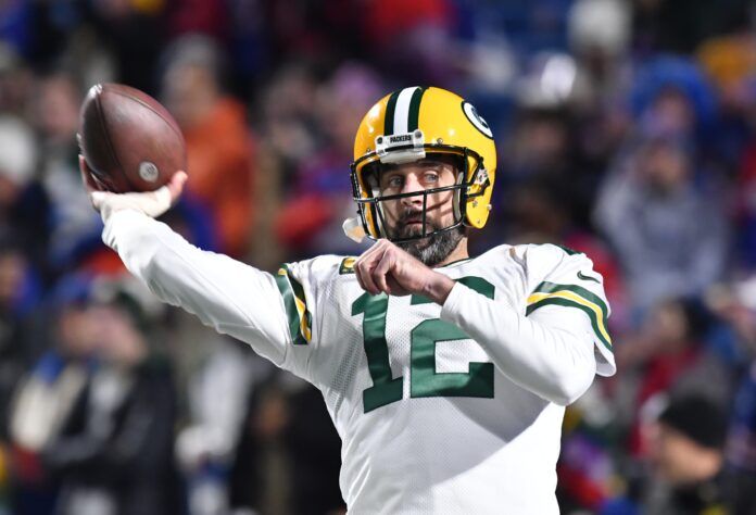 Aaron Rodgers throws a pass before a game against the Buffalo Bills.