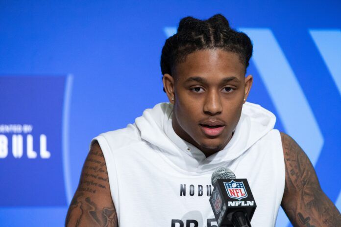 Texas A&M safety Antonio Johnson answers question at the NFL Combine.