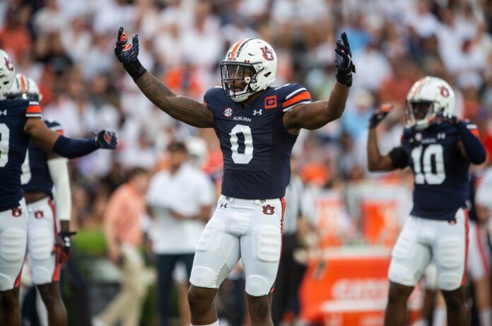 Owen Pappoe pumps up the crowd as Auburn takes on Mercer.