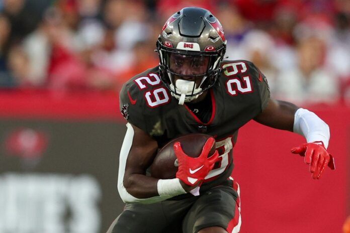 Tampa Bay Buccaneers RB Rachaad White (29) runs with the ball.