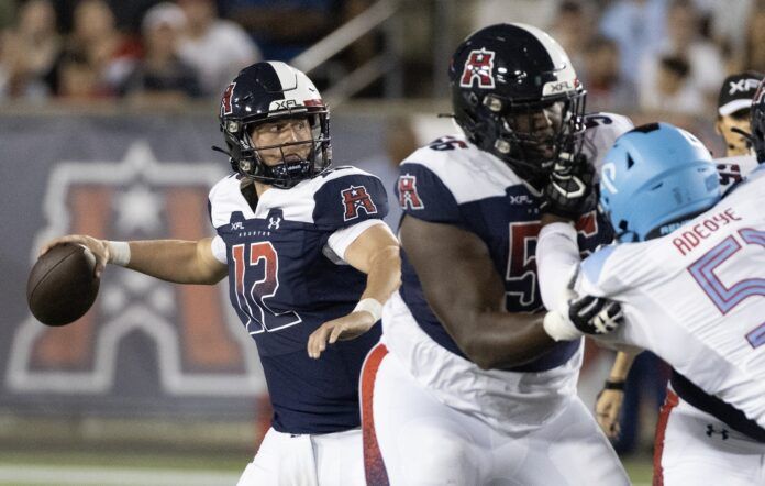 Roughnecks QB Brandon Silvers (12) drops back to pass against the Renegades.