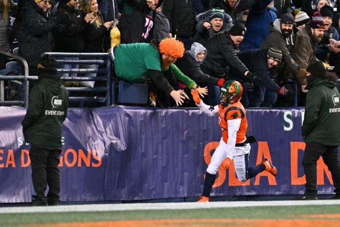 Jahcour Pearson celebrates with fans after scoring a touchdown against the Battlehawks.