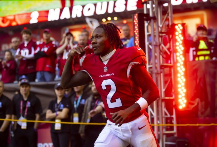 Arizona Cardinals WR Marquise Brown runs out of the tunnel.