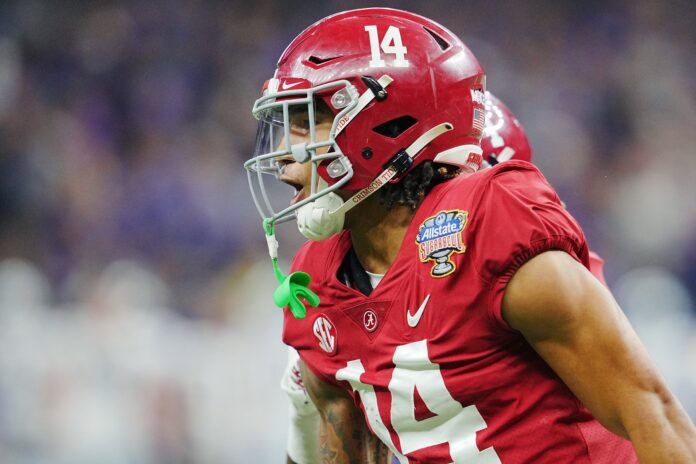 Alabama Crimson Tide defensive back Brian Branch (14) celebrates his interception.