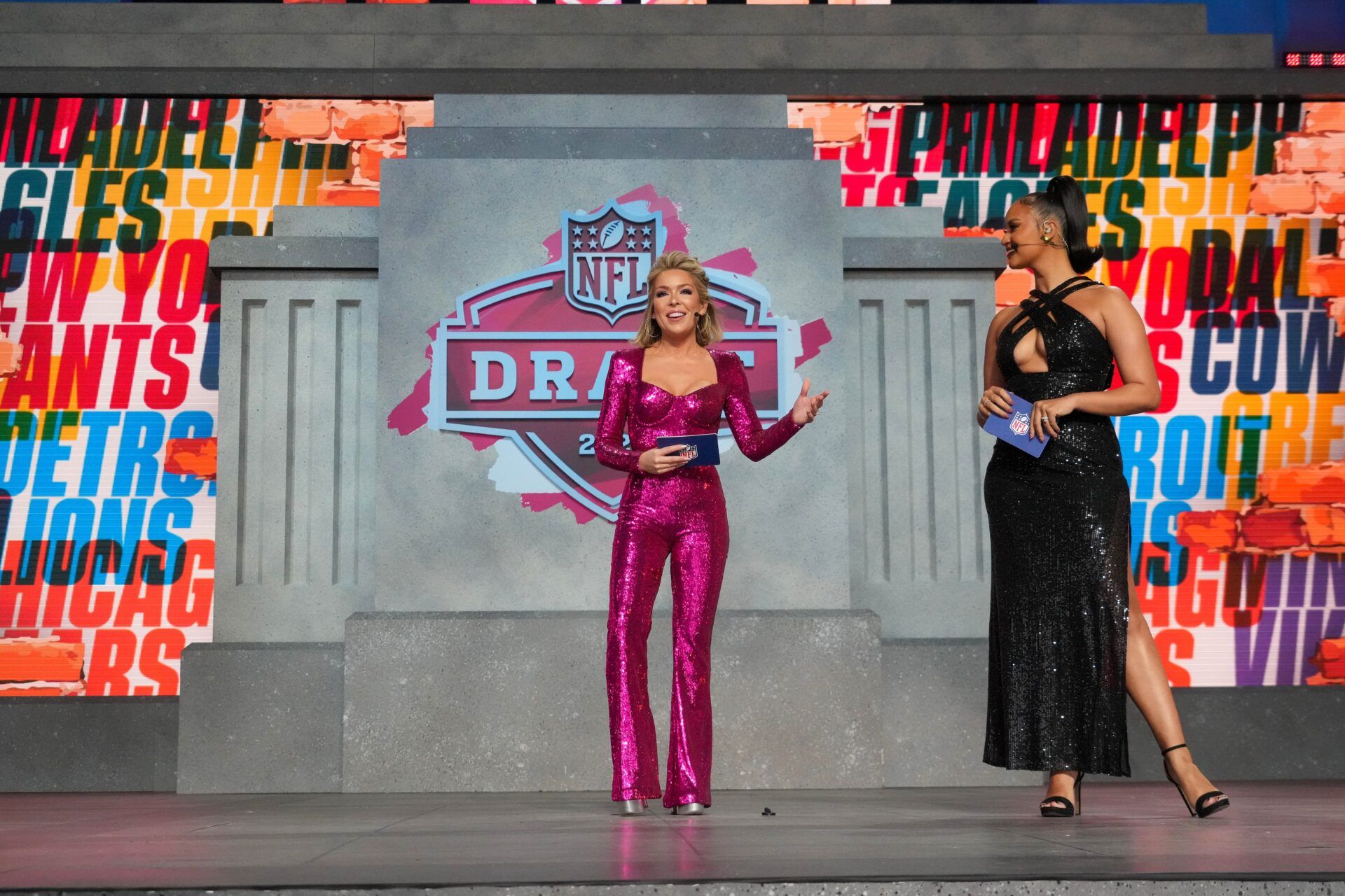NFL Networks hosts Colleen Wolfe and Kimmi Chex on stage during the first round of the 2023 NFL Draft at Union Station.