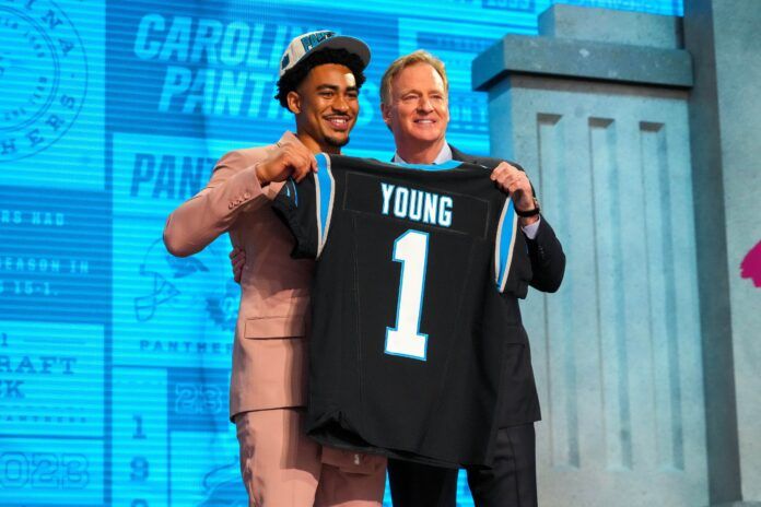 Alabama quarterback Bryce Young with NFL commissioner Roger Goodell after he was drafted first overall.