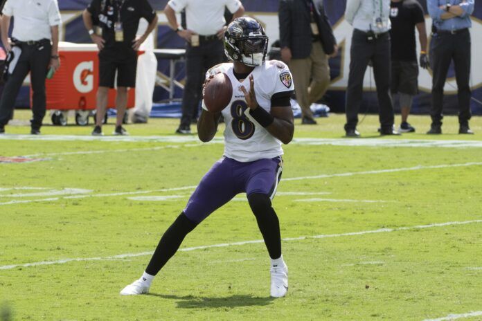 Baltimore Ravens quarterback Lamar Jackson (8) looks to pass during the first half against the Cleveland Browns.