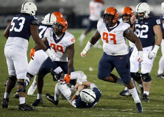 Illinois DT Calvin Avery (93) reacts after a sack against Penn State.