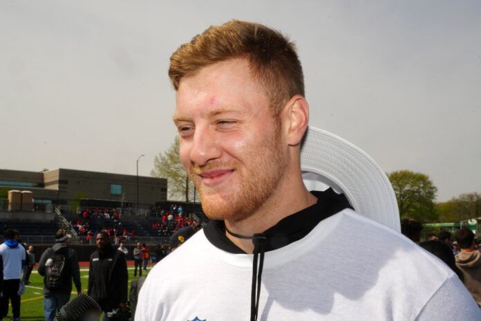 Kentucky QB Will Levis smiling during NFL Draft Play Football Clinic.