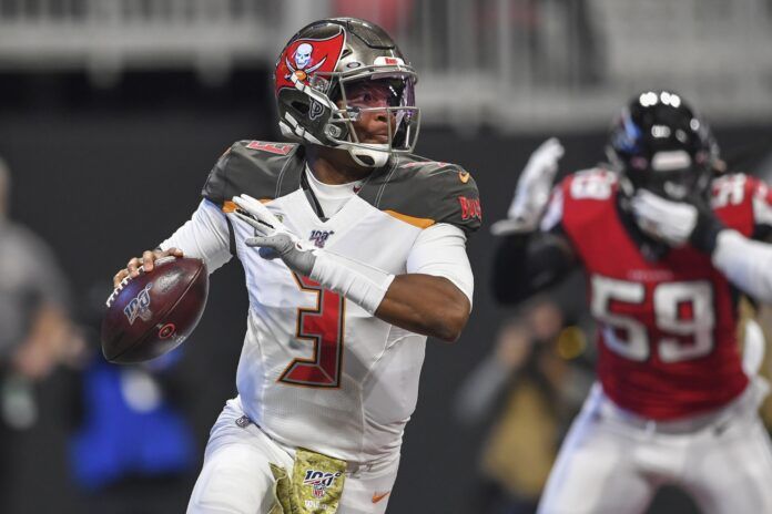 Tampa Bay Buccaneers QB Jameis Winston (3) rolls out for a pass against Atlanta.