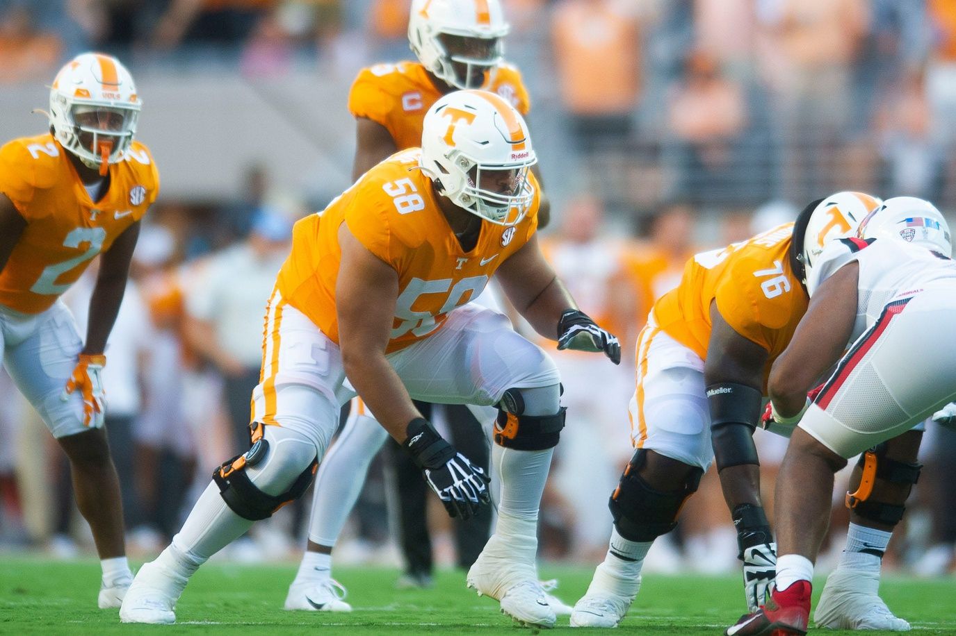 Darnell Wright (58) gets ready to engage a defender.