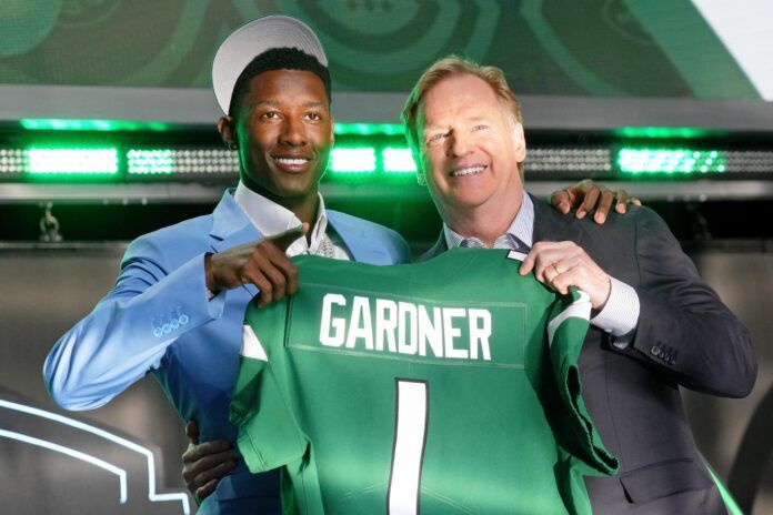 Ahmad 'Sauce' Gardner with NFL commissioner Roger Goodell after being selected as the fourth overall pick to the New York Jets.