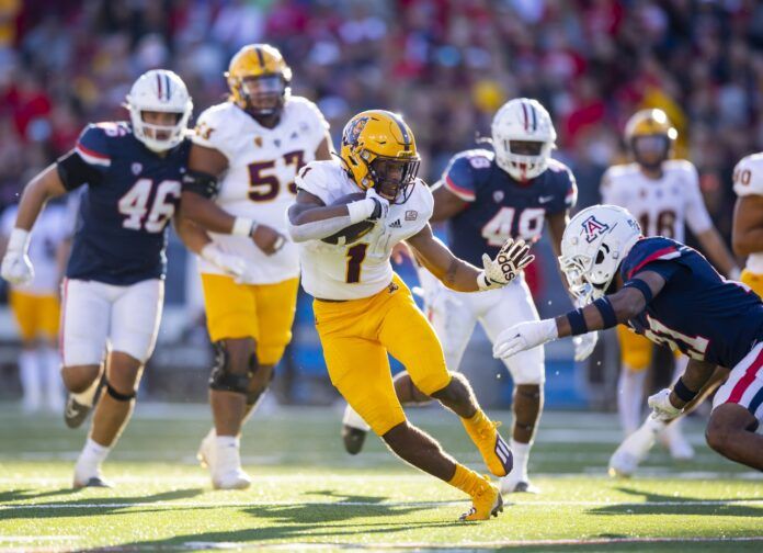 Arizona State RB Xazavian Valladay (1) running the ball against Arizona.