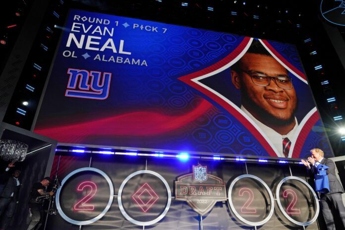 Evan Neal is announced as the seventh overall pick to the New York Giants.