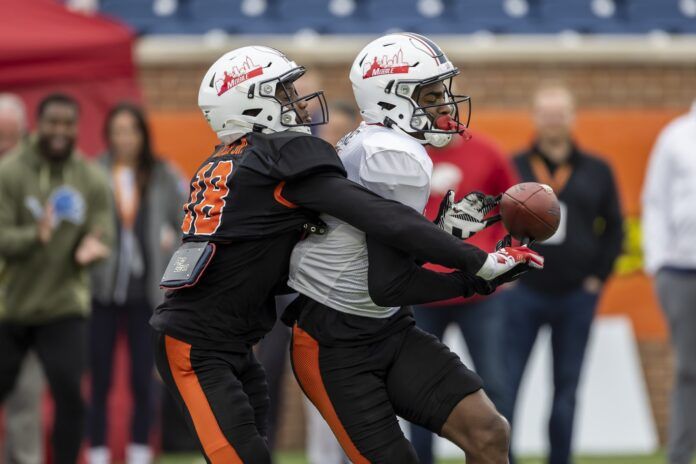 American defensive back Darrell Luter Jr. of South Alabama (18) spars with American wide receiver Jalen Wayne of South Alabama (8).