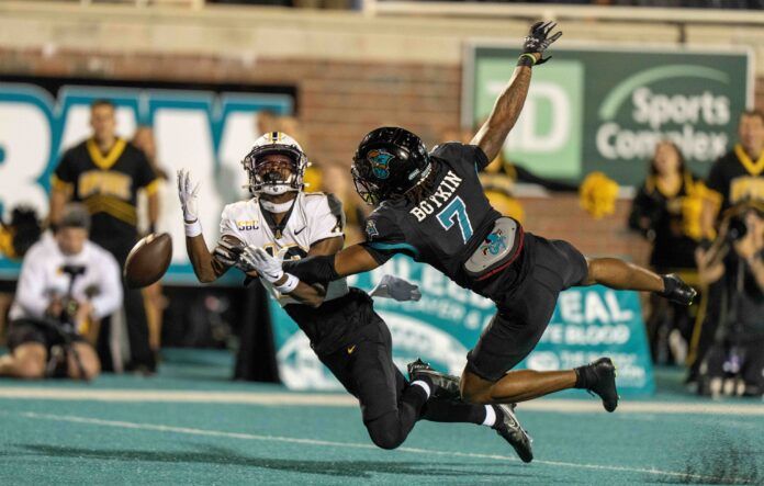 Coastal Carolina Chanticleers cornerback Lance Boykin (7) disrupts a pass.