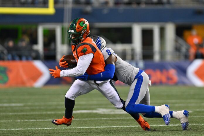 Seattle Sea Dragons wide receiver Jahcour Pearson (3) tries to break away from St. Louis Battlehawks defensive back Mike Hampton (8).