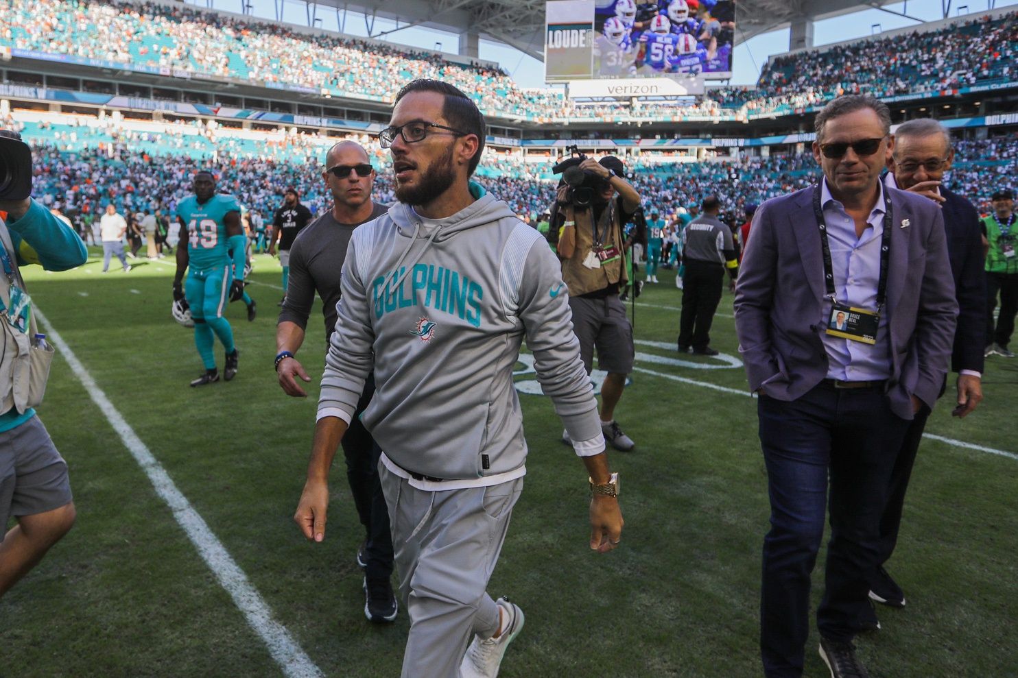 Miami Dolphins head coach Mike McDaniel walks off the field after the Dolphins' win over the Jets.