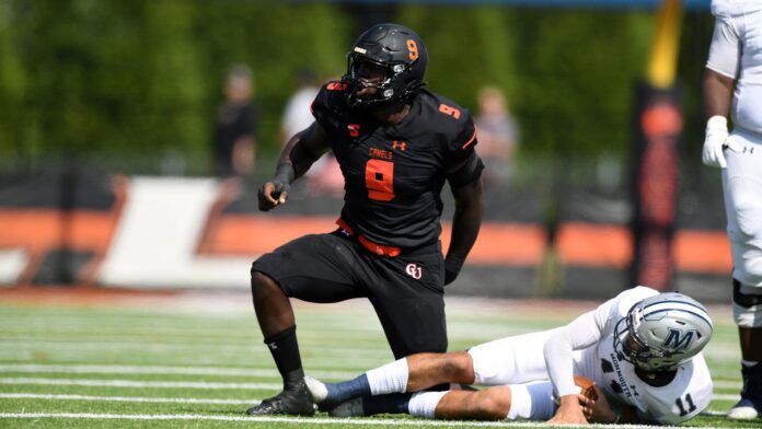 Brevin Allen reacts after sacking an opposing quarterbacks.