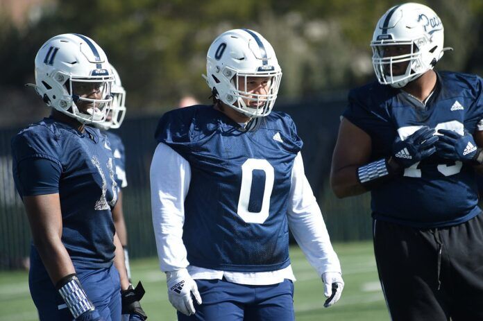 Dom Peterson (0) gets ready for a drill during the first practice of the spring in Reno.