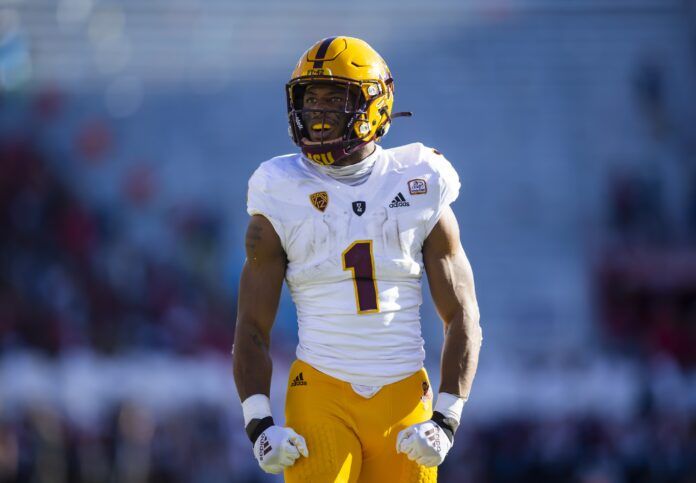 Xazavian Valladay (1) celebrates a touchdown against the Arizona Wildcats.