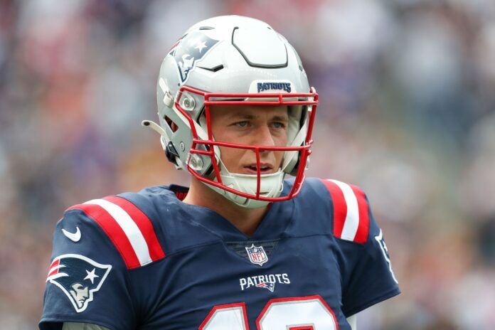 Mac Jones (10) reacts during the first half against the Baltimore Ravens.