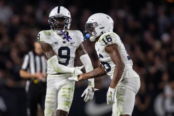 Joey Porter Jr. (9) and Penn State Nittany Lions safety Ji'Ayir Brown (16) celebrate in the second half against the Purdue Boilermakers.