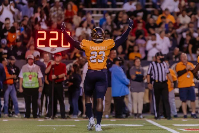 UTEP's Praise Amaewhule celebrates at a college football game against LA Tech.