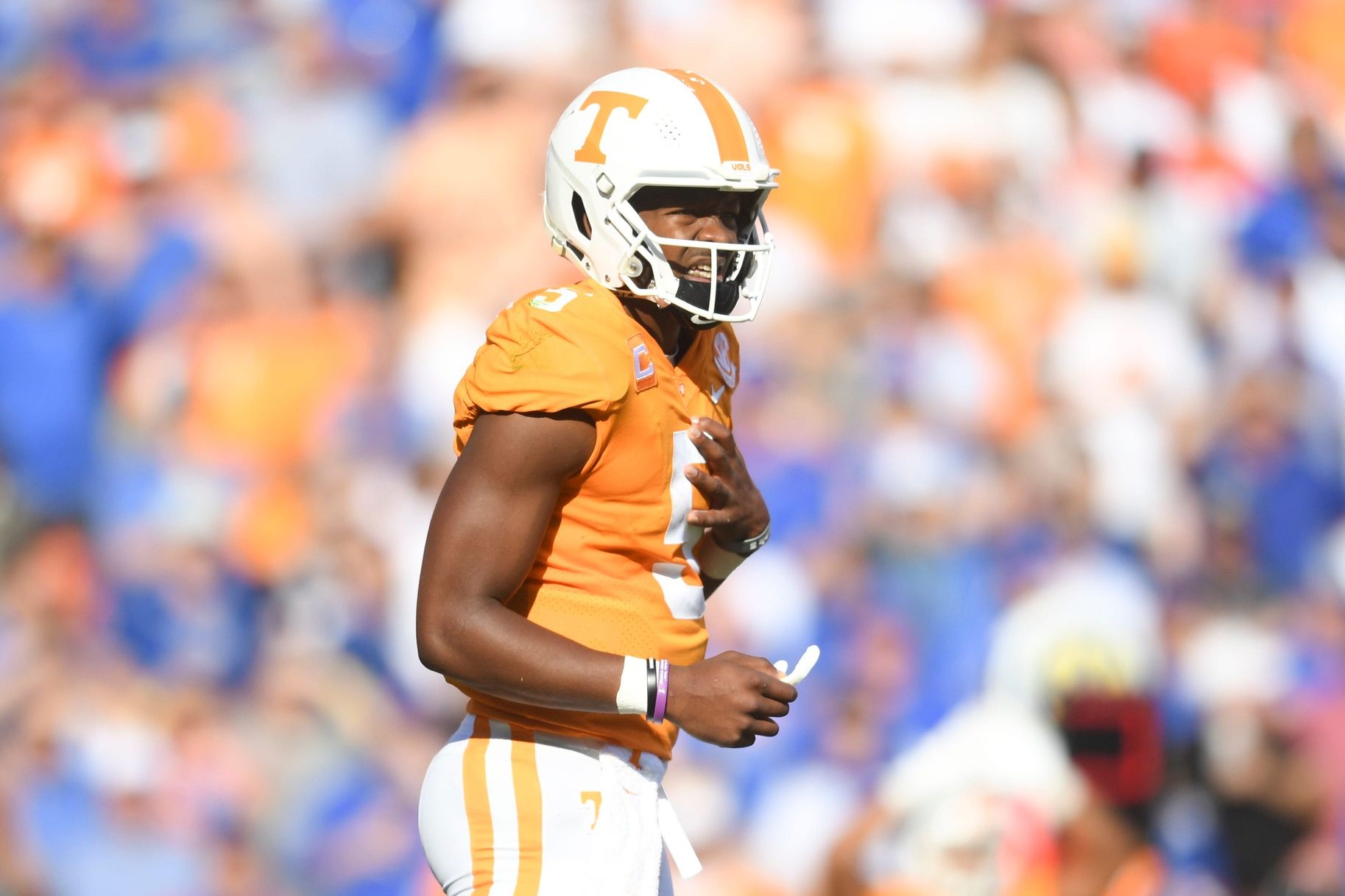 Tennessee QB Hendon Hooker (5) grabs his chest.