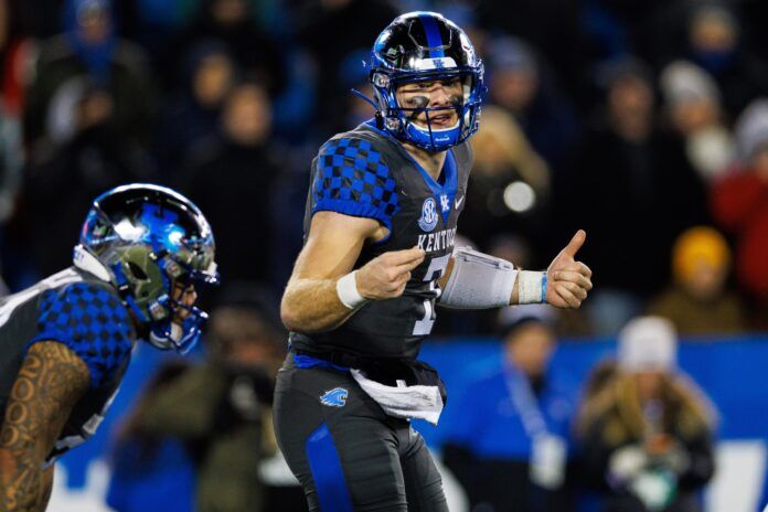 Will Levis (7) motions to his teammates during the fourth quarter against the Georgia Bulldogs.