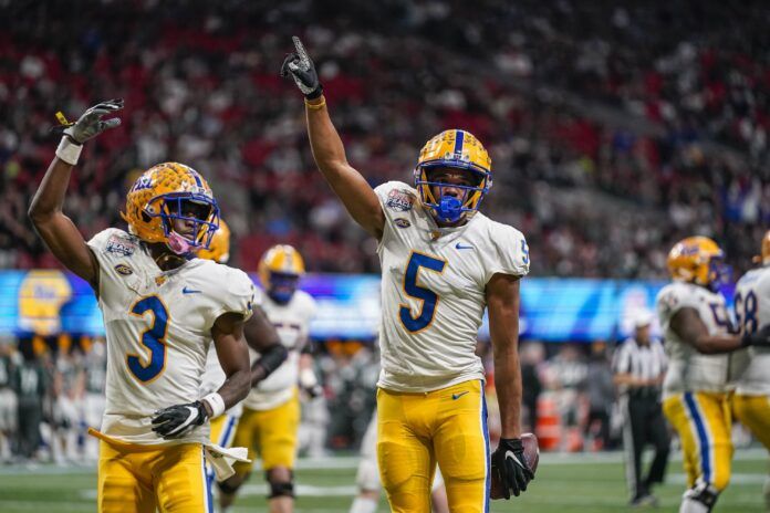 Jared Wayne (5) reacts after scoring a touchdown against the Michigan State Spartans.