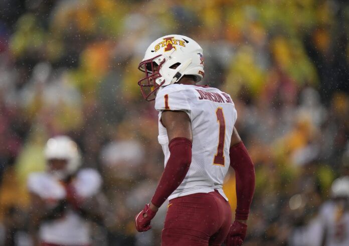 Anthony Johnson, Jr., waits for the snap in the cold raining the fourth quarter against Iowa.