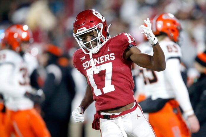 Marvin Mims Jr. (17) celebrates a return on a kick off in the first half during the Bedlam college football game.