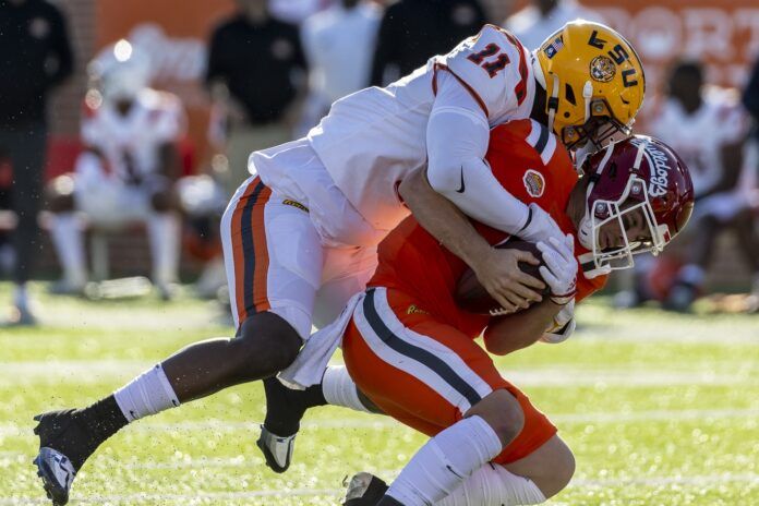 LSU EDGE Ali Gaye (11) sacks Fresno State QB Jake Haener (9) during the Senior Bowl.