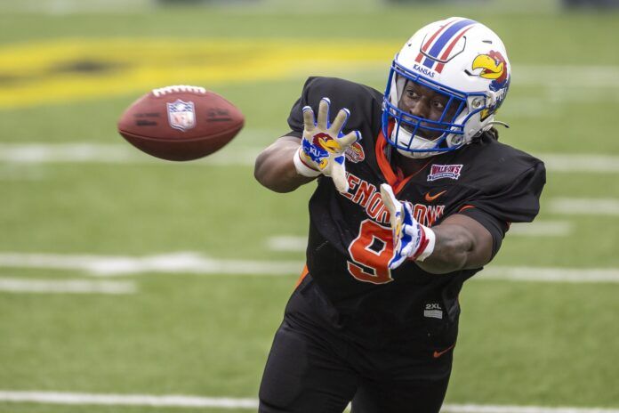 Lonnie Phelps Jr of Kansas (9) practices during the third day of Senior Bowl week at Hancock Whitney Stadium in Mobile.