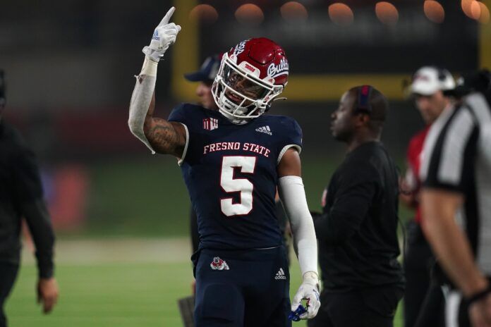 Jalen Cropper (5) reacts after catching a touchdown against the UNLV Rebels in the third quarter at Bulldog Stadium.