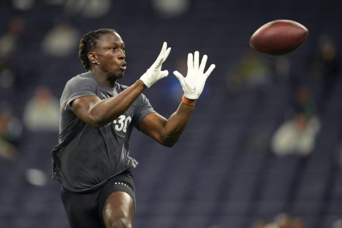 Terell Smith (DB30) participates in drills at Lucas Oil Stadium.