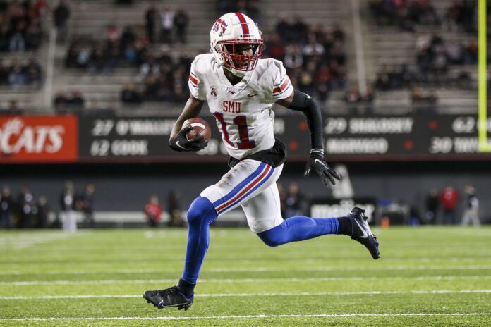 Rashee Rice runs the ball in for a touchdown against the Cincinnati Bearcats.