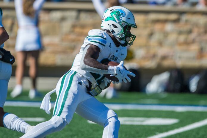 Tyjae Spears runs the ball during the second quarter against the Tulsa Golden Hurricane.